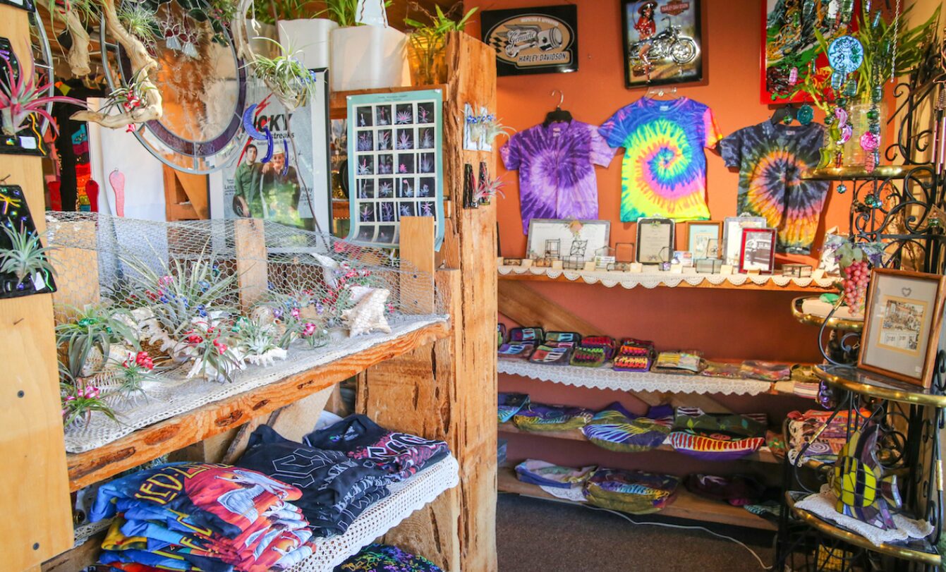 A store full of tie - dye shirts and other items.